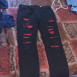 Black distressed denim jeans